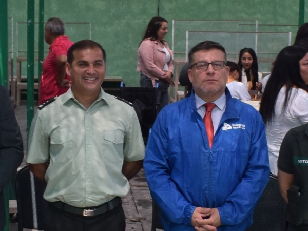El Defensor Regional de Tarapacá y el director regional de Gendarmería en una reciente ceremonia.
