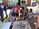Funcionarios de la Defensoría Regional de Tarapacá difundiendo derechos en medio de la vida comunitaria del pueblo de Huarasiña.