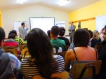 Defensores penales públicos exponiendo en la charla especialiazada de Extranjeros y Migrantes en Arica