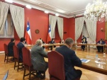 Marco Montero (a la derecha, de espaldas), durante el Consejo de Seguridad Pública desarrollado ayer en La Moneda